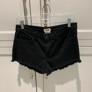 L’AGENCE frayed denim shorts
